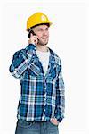 Young male architect using cellphone over white background