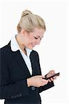 Young business woman using smartphone over white background