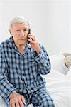 Old man calling someone in the bedroom