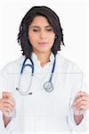 Doctor holding virtual screen on background