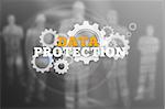 Data protection text with wheels and cogs on grey digital background