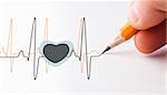 Black and yellow heart beat line drawn with a pencil