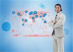 Businessman standing with a digital world map and graphs