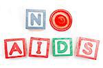 No aids spelled out in blocks and a condom on white background