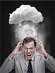 Businessman stressing out under a cloud for cloud computing with application icons