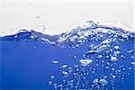 Close up on blue sparkling water on white background