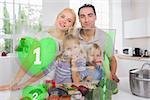 Happy family using holographic green interface to prepare dinner