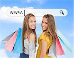 Smiling girls with their shopping bags under address bar on blue sky background