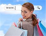 Woman looking over her shoulder with shopping bags under address bar on blue sky background
