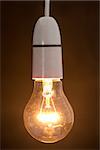 Close up of dazzling light bulb on vertical picture