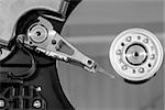 Close up of a spindle of disk drive in black and white