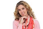 Smiling blonde woman posing with her hand on her chin on white background