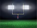 Empty football field with spotlight at night