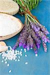 Lavender spa - fresh flowers and aromatic salt on blue  table