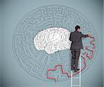 Businessman on ladder  trying to solve a large maze with a brain illustration