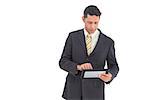 Businessman wearing a suit with pc tablet