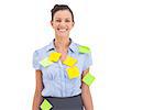 Businesswoman with adhesive notes on her shirt