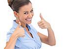 Smiling businesswoman with thumbs up looking at the camera