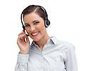 Smiling customer service agent with headset looking at the camera