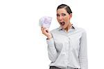 Cheerful businesswoman showing lot of money on white background