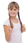Pretty little girl giving thumbs up on white background