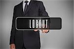 Businessman selecting label with logout written on it on grey background
