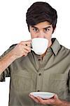 Man drinking cup of coffee on a white background