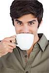 Portrait of man drinking coffee on a white background