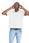 Man listening to music with headphones on a white background