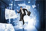 Businessman jumping in a corridor of a data center with drawings around