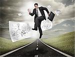 Businessman jumping on a road with drawings floating around