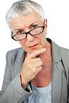 Thinking mature woman wearing glasses on white background