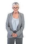 Serious businesswoman with glasses on white background