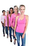 Happy women wearing pink and ribbons for breast cancer on white background