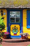 Traditional ornate door in Born, Fischland-Darss-Zingst, Coast of the Baltic Sea, Mecklenburg-Western Pomerania, Germany, Europe