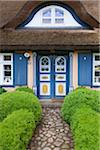 Traditional house with thatched roof in Born, Fischland-Darss-Zingst, Coast of the Baltic Sea, Mecklenburg-Western Pomerania, Germany, Europe