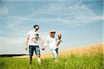 Family Walking by Agricultural Field, Mannheim, Baden-Wurttemberg, Germany