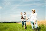 Family Walking by Agricultural Field, Mannheim, Baden-Wurttemberg, Germany