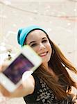 Teenage Girl taking Self Portrait in Skatepark, Feudenheim, Mannheim, Baden-Wurttemberg, Germany