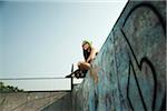 Teenage Girl Hanging out in Skatepark, Feudenheim, Mannheim, Baden-Wurttemberg, Germany