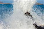 ocean wave breaking in Galapagos Islands