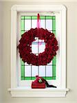 Window Decorated with Christmas Wreath and Gift
