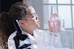 Girl holding conical flask