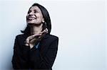 Studio portrait of businesswoman smiling