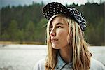 Portrait of woman wearing cap headwear