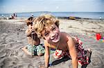 Two boys playing on beach