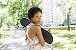 Woman hugging skateboard