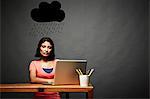 Woman sitting under dark rain cloud