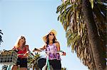 Women chatting on bicycle