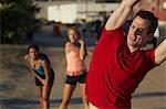 People doing stretching exercise